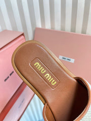 SLIDES SANDALS IN BROWN STRAW WOVEN