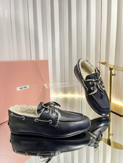 MIUMIU 26S FUR BOAT SHOES IN BLACK CALFSKIN