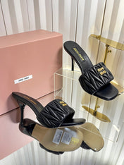 MIUMIU 26S HIGH-HEEL MULE SANDALS 85MM IN BLACK CALFSKIN GOLD HARDWARE