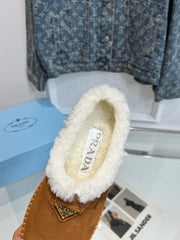 TRIANGLE LOGO MULES IN BRONZE BROWN SUEDE AND SHEARLING LINING