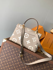 MADELEINE 30 IN BEIGE MONOGRAM CALFSKIN EMBOSSED LOGO