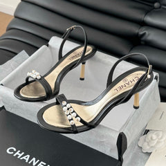 PEARL SANDAL IN BLACK AND GOLD LAMBSKIN 75 MM