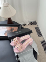 MULE SLIDE SANDALS IN PINK LAMBSKIN WITH LOGO STICKER DETAIL