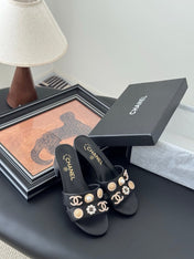 MULE SLIDE SANDALS IN BLACK LAMBSKIN WITH LOGO STICKER DETAIL