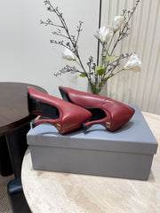 CURVED HEEL SHALLOW MOUTH PUMPS IN CADILLAC CALFSKIN