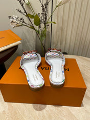 FLAT MULES IN WHITE MONOGRAM LAMBSKIN
