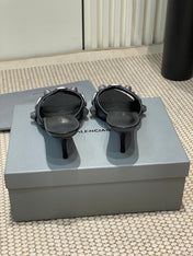 CAGOLE HIGH MULES IN BLACK OIL-WAX SHEEPSKIN