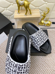 BALMAIN 25S BALMAIN MULES IN BLACK AND WHITE CALFSKIN