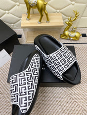 BALMAIN 25S BALMAIN MULES IN BLACK AND WHITE CALFSKIN