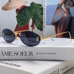 FIRST CRYSTAL RIMLESS OVAL FRAME SUNGLASSES 557152 IN METAL