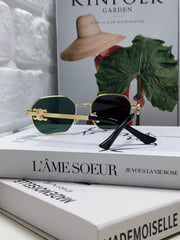 TRIOMPHE SUNGLASS 497821 IN GOLD METAL DARK TEAL LENSES
