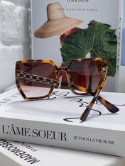 TRIOMPHE SUNGLASS 497830 IN HAVANA ACETATE EMBOSSED LOGO