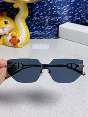 MONTAIGNE SUNGLASS 563194 IN GOLD METAL GREY LENSES