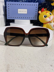 SQUARE FRAME SUNGLASSES 573309 IN ACETATE EMBOSSED LOGO