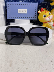 SQUARE FRAME SUNGLASSES 573309 IN ACETATE EMBOSSED LOGO