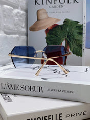 PANTHÈRE RIMLESS GEOMETRIC FRAME SUNGLASSES  539743 IN METAL