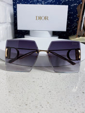 30MONTAIGNE S7U SUNGLASS 578109 IN GOLD METAL GREY SMOKE LENSES