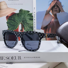 MONOGRAM SUNGLASS 581386 IN BLACK ACETATE FRAME