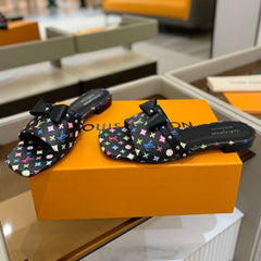 LV X TM 6AM FLAT MULE IN BLACK MONOGRAM CALFSKIN