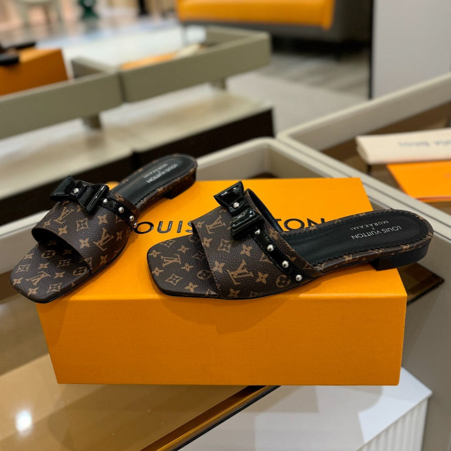 LV X TM 6AM FLAT MULE IN CHOCOLATE BROWN MONOGRAM CALFSKIN