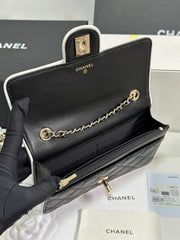 QUILTED FLAP BAG WITH WHITE TRIM 19 IN BLACK LAMBSKIN