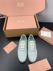 MIUMIU 26S LACE UP SNEAKERS IN PALE MINT CANVAS RUBBER SOLE
