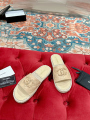 FLAT SLIPPERS IN BEIGE CREAM LAMBSKIN AND WOVEN WITH LOGO