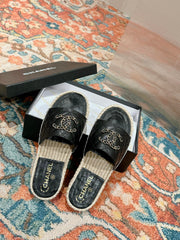 FLAT SLIPPERS IN BLACK LAMBSKIN AND WOVEN WITH LOGO