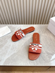 DIOR FLAT SLIDES 25S IN DARK ORANGE CALFSKIN AND FABRIC BRAND NAME EMBROIDERY