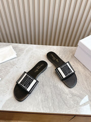 DIOR FLAT SLIDES 25S IN BLACK CALFSKIN AND FABRIC BRAND NAME EMBROIDERY