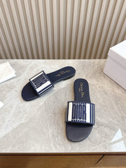 DIOR FLAT SLIDES 25S IN MIDNIGHT BLUE CALFSKIN AND FABRIC BRAND NAME EMBROIDERY