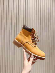 CELINE 25S MARTIN BOOTS IN MEDIUM ORANGE CALFSKIN