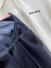 MIUMIU PLEATED LOW-BACK SIDE-SLIT MIDI SKIRT 275985