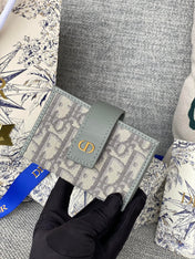 MONTAIGNE WALLET 11 IN OSLO GREY MONOGRAM OBLIQUE JACQUARD