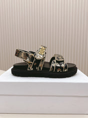 DIOR BACK-STRAP SANDALS 25S IN BLACK AND GOLD CALFSKIN WITH BUTTERFLY MOTIF