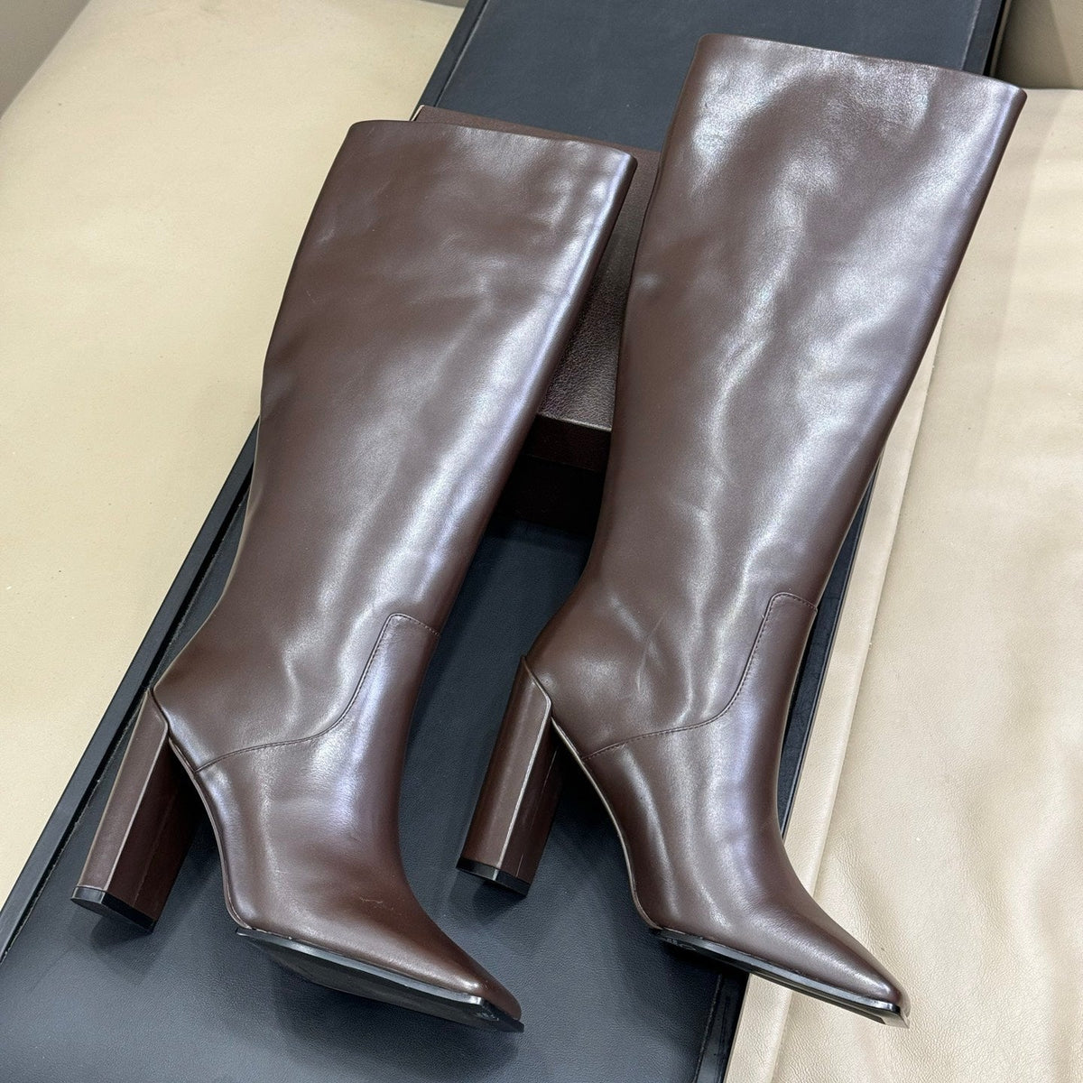 ALAIA 25S KNEE-HIGH SQUARE-TOE BOOTS IN BROWN CALFSKIN