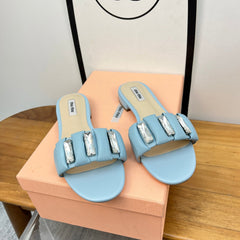 FLAT SLIDE IN LIGHT BLUE CALFSKIN