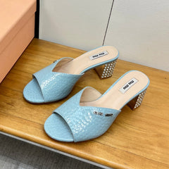 JEWELLED HEEL 55 MULE SANDALS IN LIGHT BLUE CALFSKIN