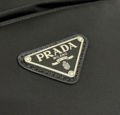 PRADA 25S BACKPACK 39 IN BLACK RE-NYLON AND SAFFIANO CALFSKIN