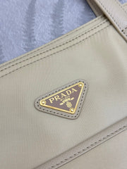 PRADA 25S RE-EDITION 1978 MEDIUM 35 IN DESERT BEIGE NYLON AND SAFFIANO CALFSKIN