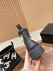 CC RAIN BOOTS BLACK TPU WITH WHITE LOGO 01