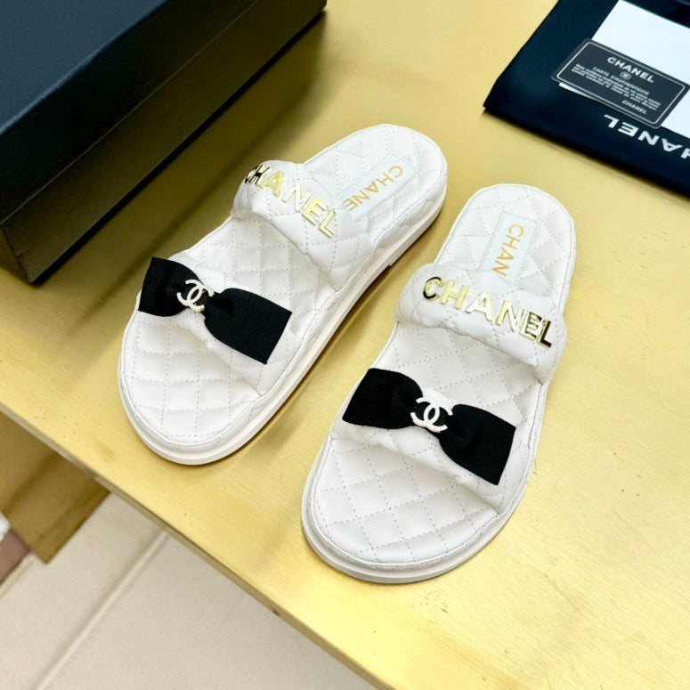 DAD SANDALS WITH BOW IN WHITE LAMBSKIN MULE
