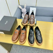 LOAFER WITH TRIANGLE LOGO IN BLACK CALFSKIN
