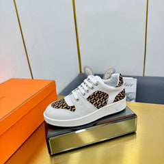 FREE SNEAKER IN WHITE CALFSKIN AND "H EN BIAIS" BROWN CANVAS