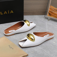 ALAIA FLAT MULE IN WHITE LAMBSKIN WITH GOLD HARDWARE