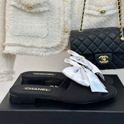 Double CC big bow flat sandals Sheepskin White Black