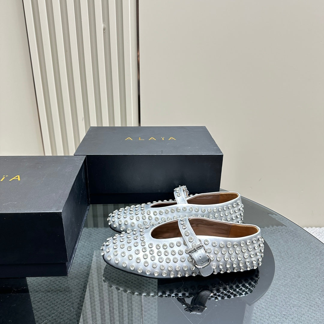 ALAIA CRYSTAL EMBELLISHED BALLET FLATS IN SILVER CALFSKIN