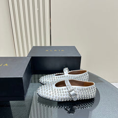 ALAIA CRYSTAL EMBELLISHED BALLET FLATS IN SILVER CALFSKIN