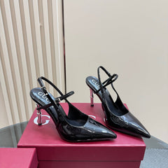 POINTED-TOE HIGH BAMBOO-EFFECT HEEL SLINGBACK IN BLACK PATENT CALFSKIN