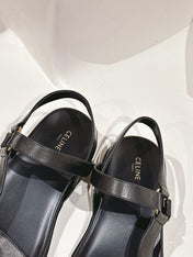 MAUD SANDAL WITH TRIOMPHE IN BLACK CALFSKIN